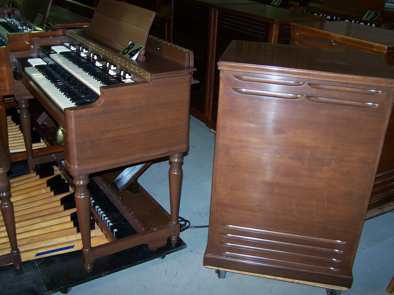 83 is a Custom Finished GLOSS Ebony Hammond B3 organ 93264 from 1964