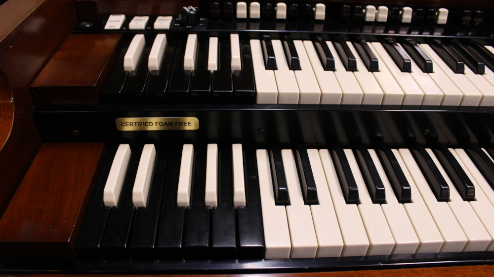 340 is a 1957 Hammond  B3 in a Walnut finish.