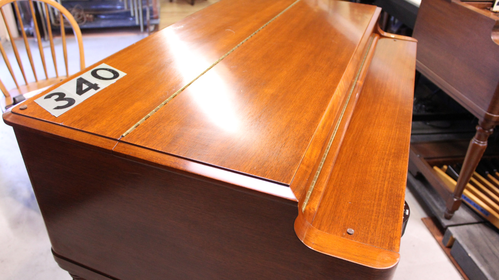 340 is a 1957 Hammond  B3 for sale in a Walnut finish.