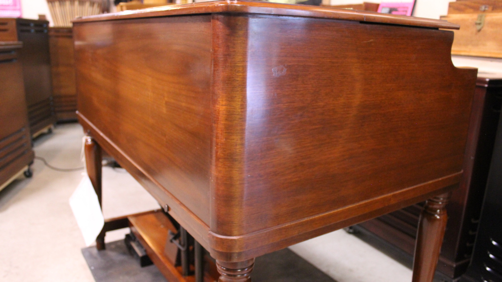 340 is a 1957 Hammond  B3 in a Walnut finish.