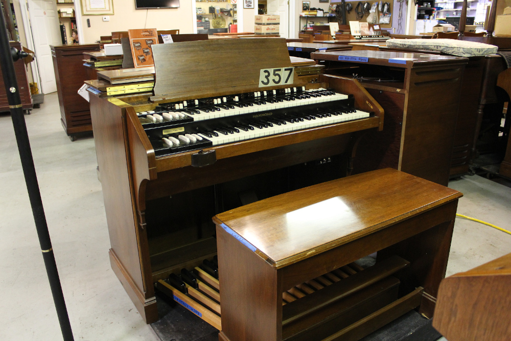 357 is a 1968 Hammond C-3 in a walnut finish, paired with a Leslie speaker!