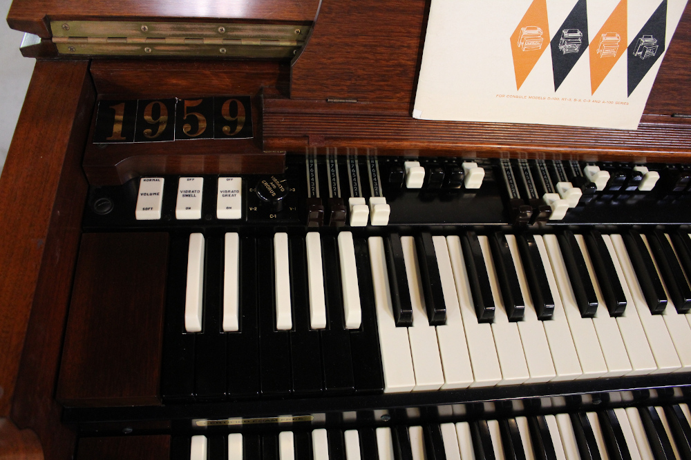410 is a 1959 Hammond B-3 in a walnut finish.