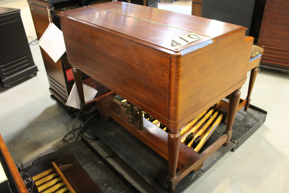 410 is a 1959 Hammond B-3 in a walnut finish.