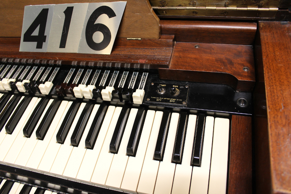 416 is a 1950 Hammond C-2 that has a scratched finish but sounds great!