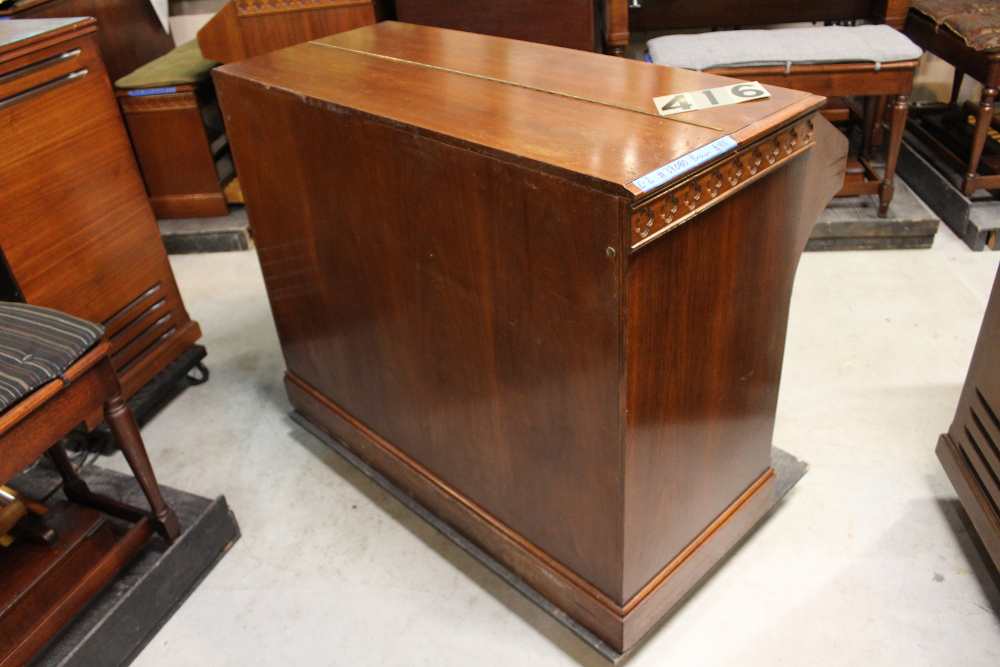 416 is a 1950 Hammond C-2 that has a scratched finish but sounds great!