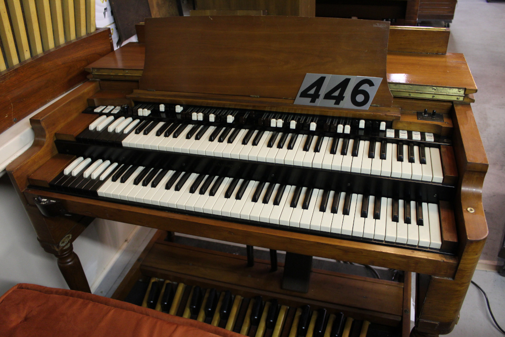 446 is a 1959 Hammond B3 in a fruitwood finish! Due to its scratched exterior, this is one of our finest options of a budget-friendly fruitwood B3! Serial #77434