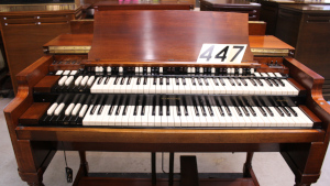 447 is a 1957 Hammond B-3 for sale in a beautiful Walnut finish matching 122