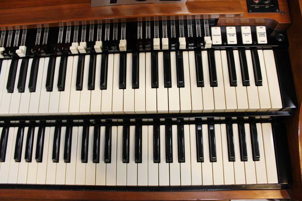 462 is 1964 Hammond A-143 in a fruitwood finish, to be paired with a Leslie 45. The toggle switches that control the Leslie speed and audio signal will be replaced with the moon shaped Leslie switch, which most of us prefer.