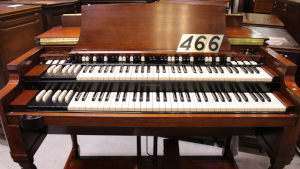 466 is a 1957 Hammond B-3 in a mahogany finish.
