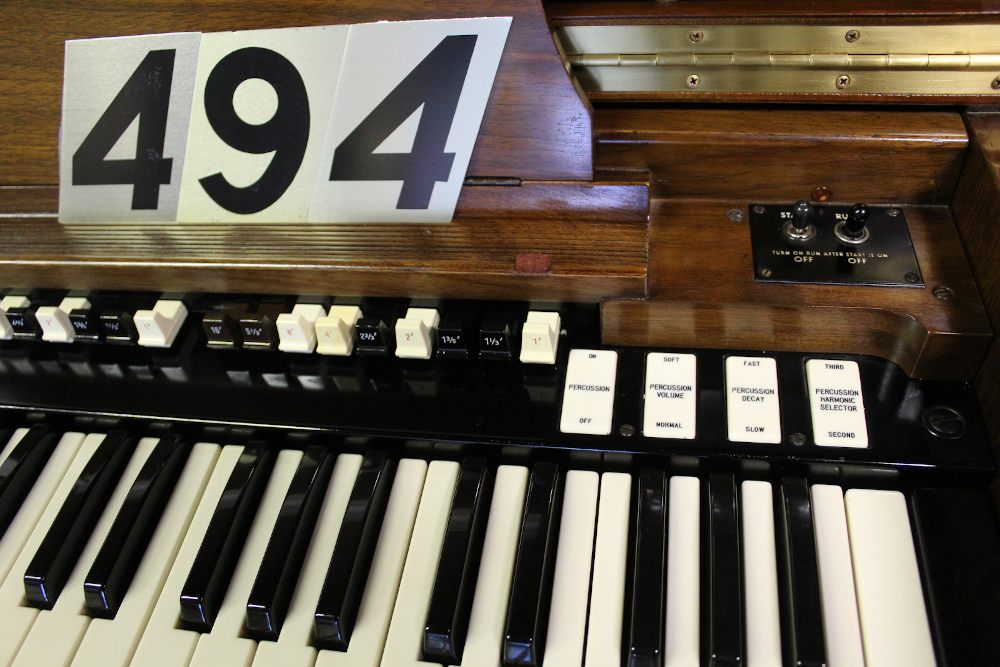 is a 1969 Hammond C3 in a walnut finish with engraved drawbars in mint condition! Serial #A-24339