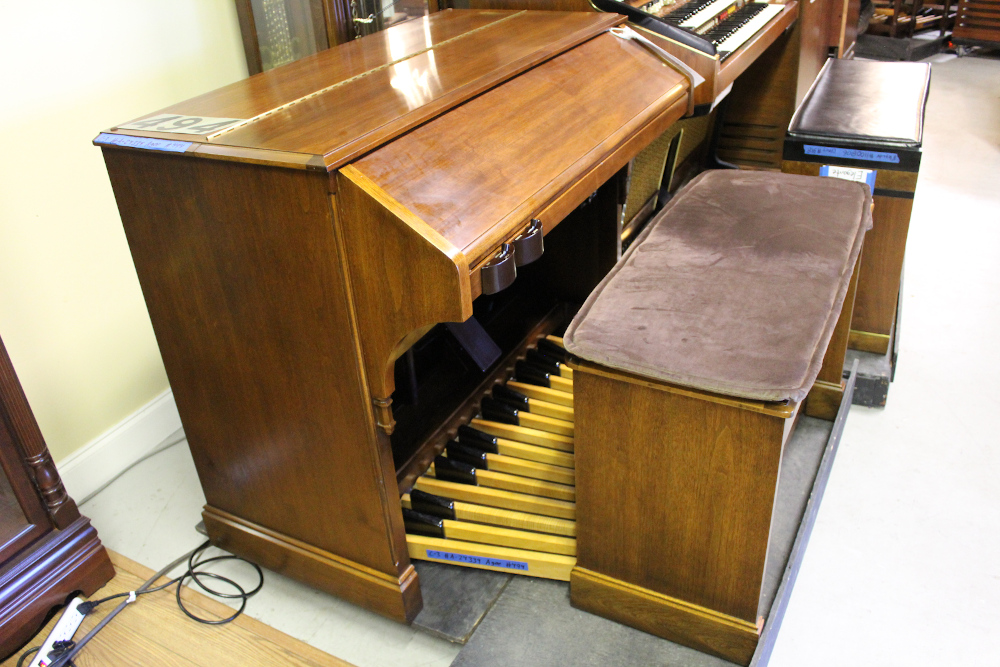 is a 1969 Hammond C3 in a walnut finish with engraved drawbars in mint condition! Serial #A-24339