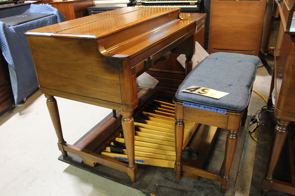 496 is a 1971 Hammond B-3 in a walnut finish.. 