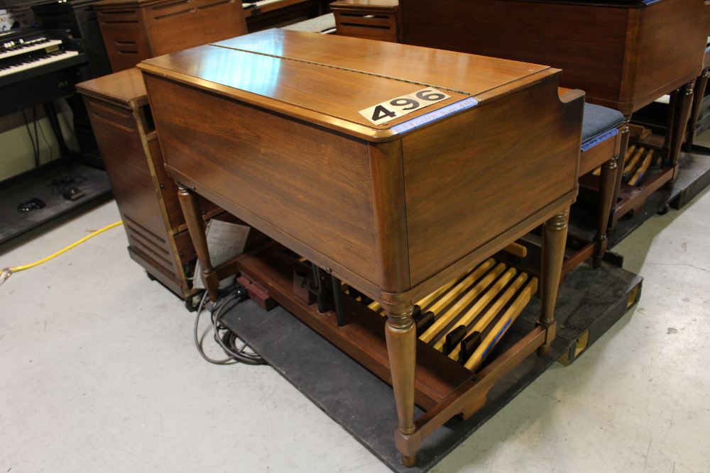 496 is a 1971 Hammond B-3 in a walnut finish.. 