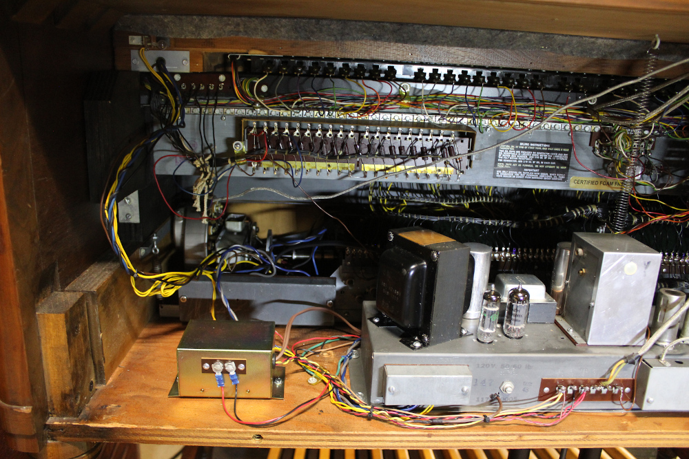 496 is a 1971 Hammond B-3 in a walnut finish.. 