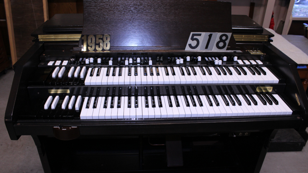 518 is a 1958 C3 in Custom Black Stain Laquer finish