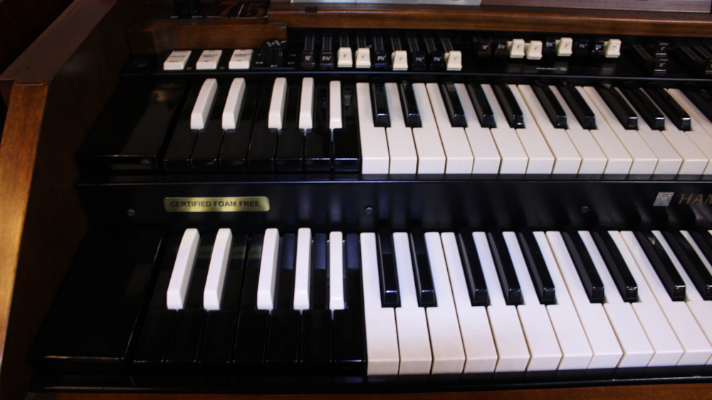 540 is a Hammond A105 in a Walnut finish.