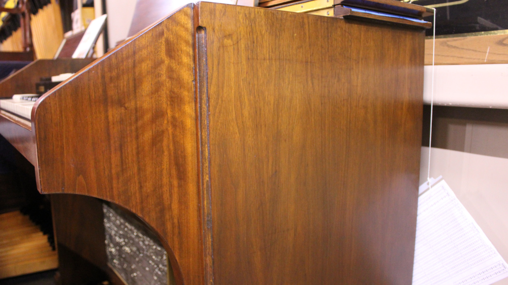 540 is a Hammond A105 in a Walnut finish.