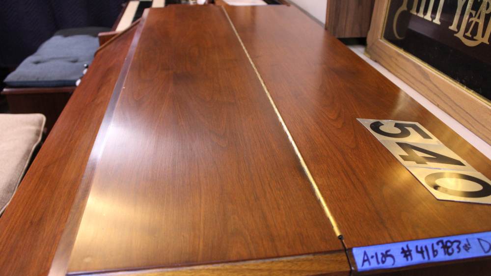540 is a Hammond A105 in a Walnut finish.