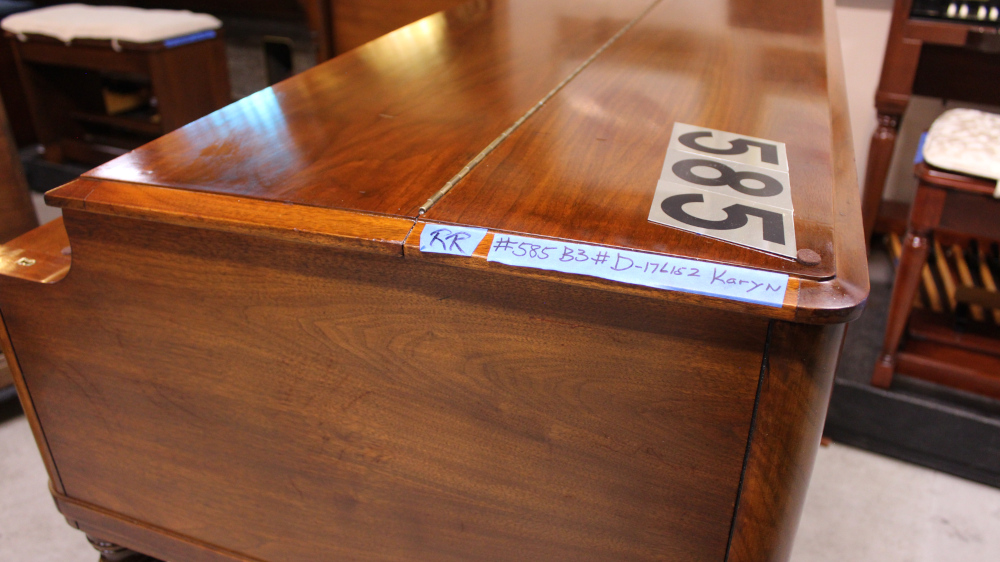 585 is a 1972 Hammond B3 in a Walnut finish.  Serial #D-176152 