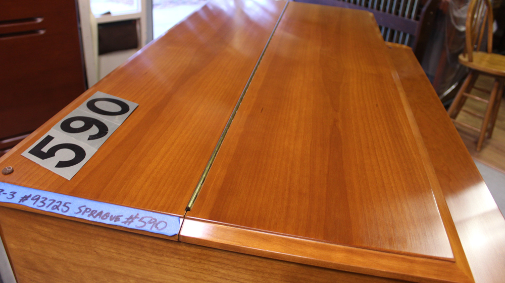 590 is a 1964 Hammond  B3 for sale in a Walnut finish.