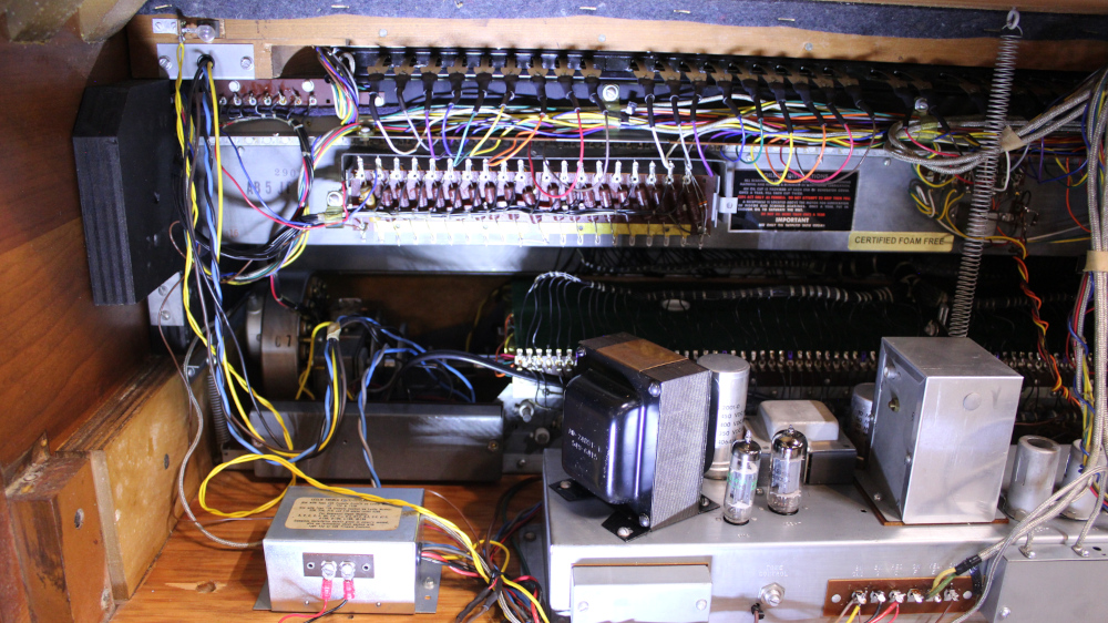 590 is a 1964 Hammond  B3 for sale in a Walnut finish.