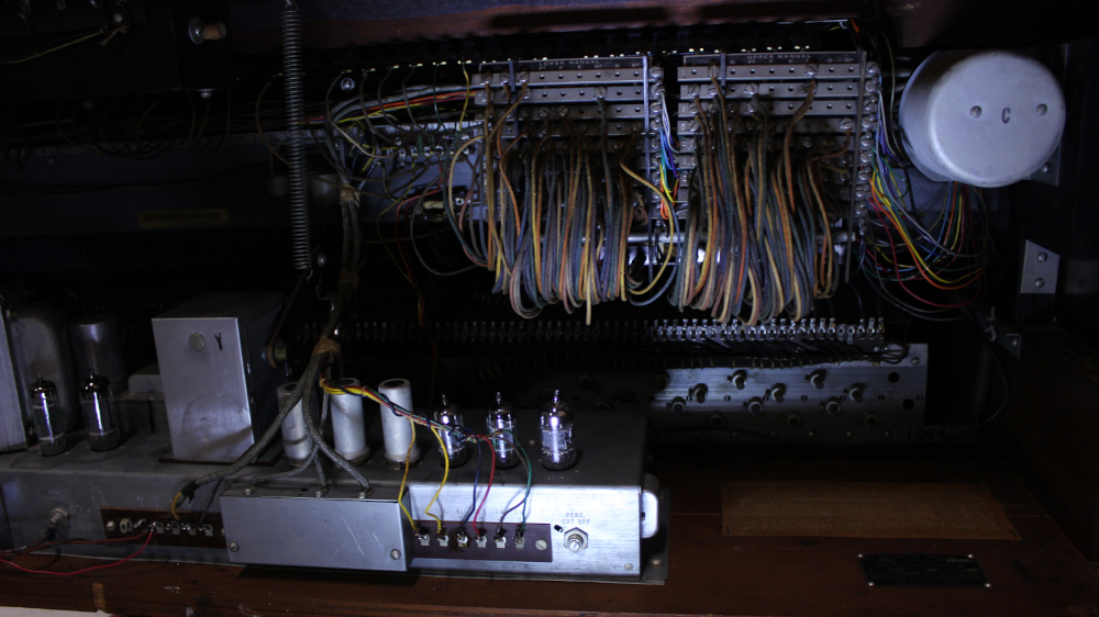 591 is a 1957 Hammond B3 for sale in a Walnut finish.