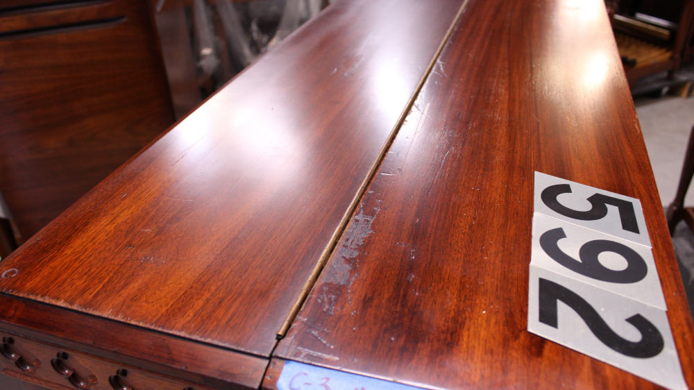 592 is a 1957 Hammond C3 in a Walnut finish.