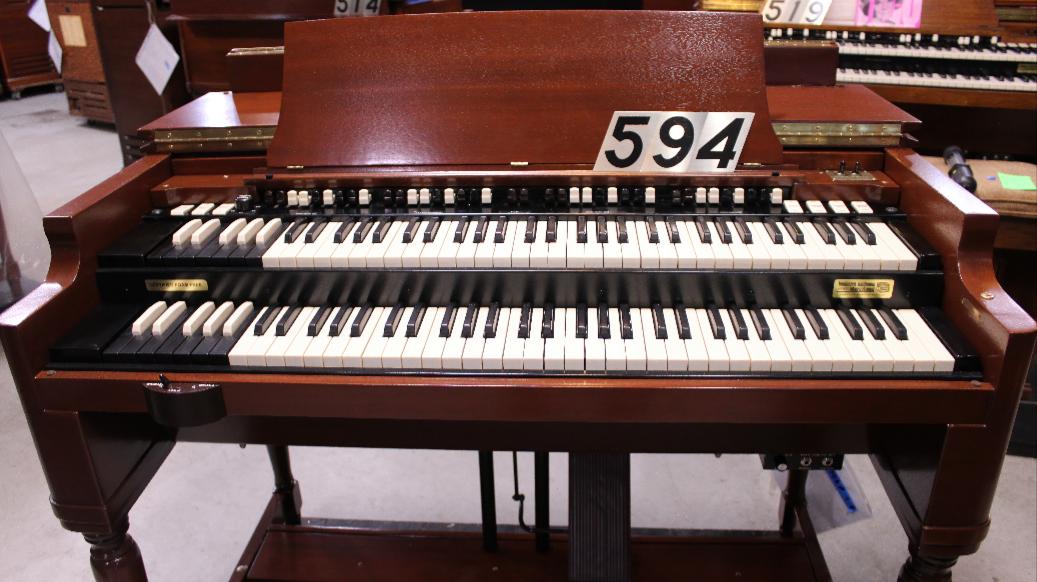 594 is a 1951 Hammond B2/B3 refinished in Cherry-wood.