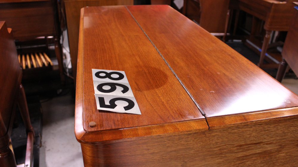 591 is a 1957 Hammond B3 in a Walnut finish.