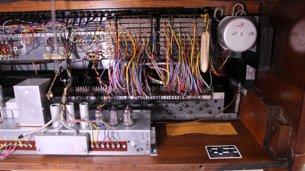 591 is a 1957 Hammond B3 for sale in a Walnut finish.