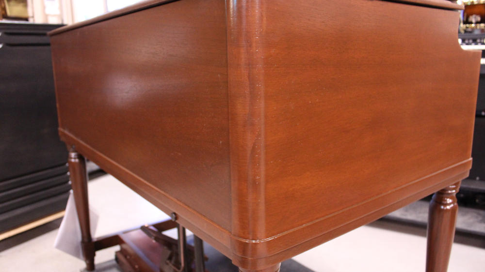 615 is a 1952 Hammond B2 converted to a B3 in a walnut finish.  Serial #45915