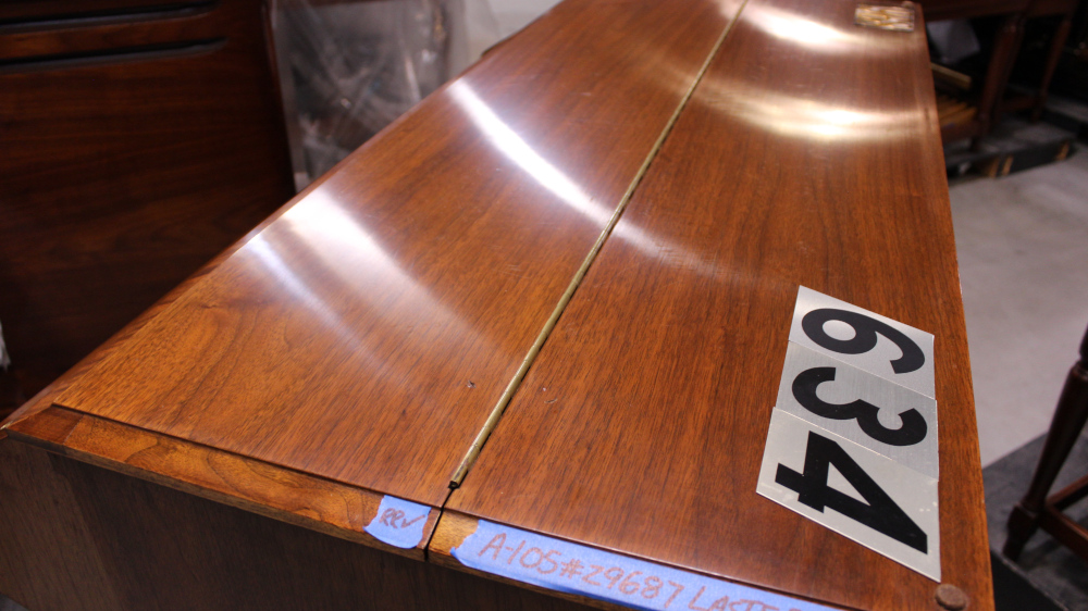 634 is a 1968 Hammond A105 in a Walnut finish.  Serial # 29687