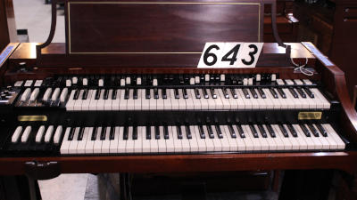 643 is a 1963 Hammond A-100 in a mahogany finish for sale!