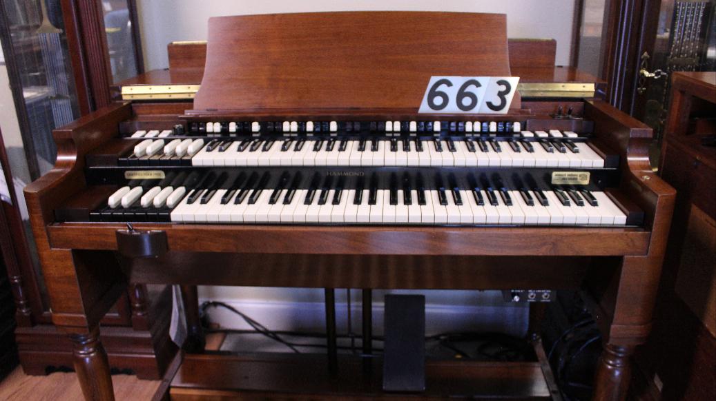 663 is a 1950 Hammond B2/B3 in a walnut finish SOLD!.  Serial #36877