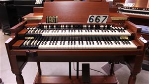 #667 is a 1961 Hammond B3 in a walnut finish for sale!