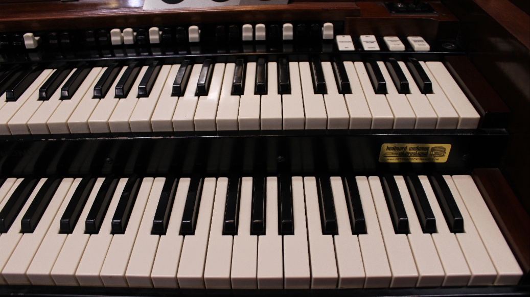 668 is a 1959 Hammond C3 in a Walnut finish for sale.