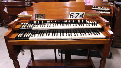 #674 is a 1958 Hammond B3 in a fruitwood finish for sale!