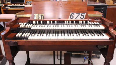 675 is a 1957 Hammond B3 in a walnut finish for sale!