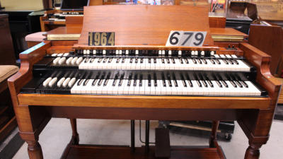 679 is a 1964 Hammond B3 in a mahogany finish for sale!