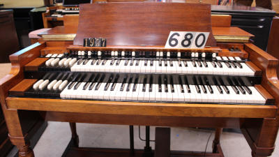 680 is a 1957 Hammond B3 in a mahogany finish for sale!