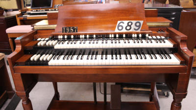 689 is a 1957 Hammond B3 in a mahogany finish for sale!
