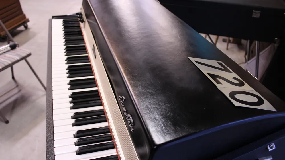 720 is a Rhodes Suitcase 73 Electric Piano for sale!