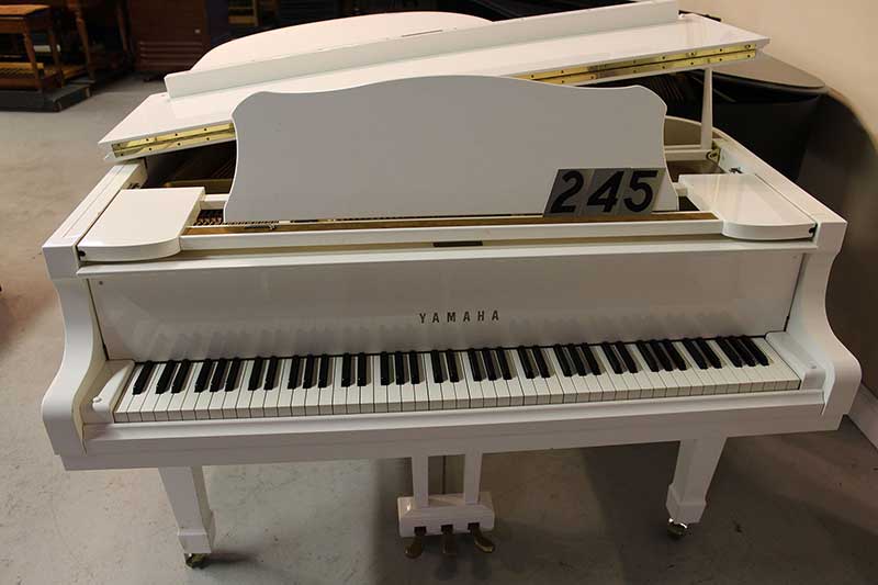 245 - White Yamaha Grand Piano SOLD!
